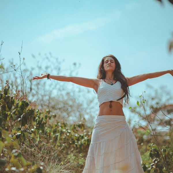 Person meditating peacefully in a calm environment showing well-being.